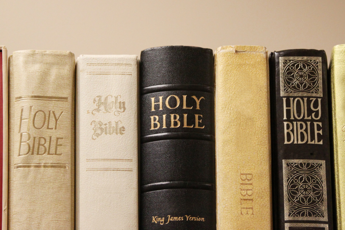 An image of different versions of the Holy Bible.