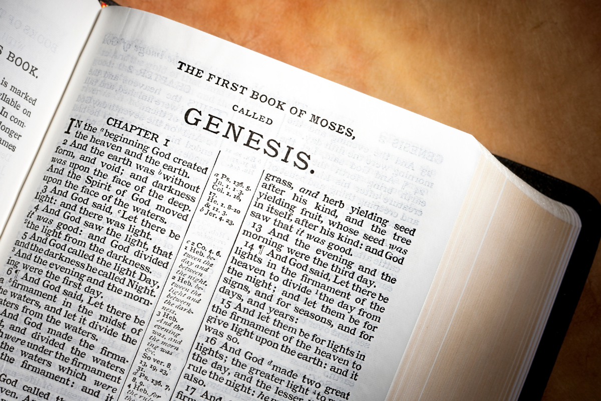 An image of the first page of the Book of Genesis in the Holy Bible.