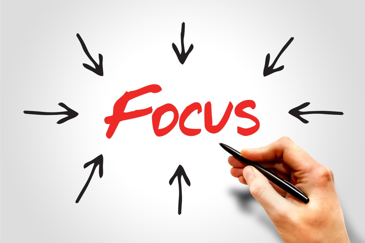 A number of arrows pointing at the word "Focus".