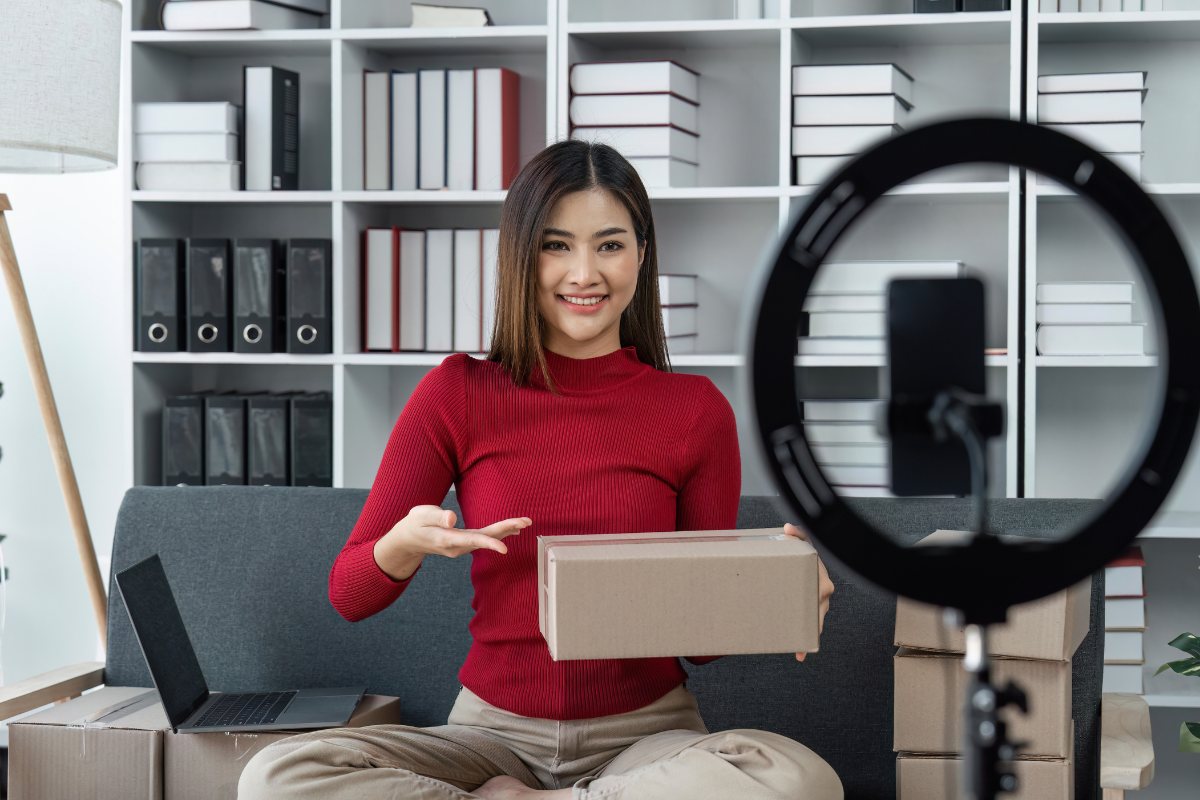 An image of a woman doing an online selling session.